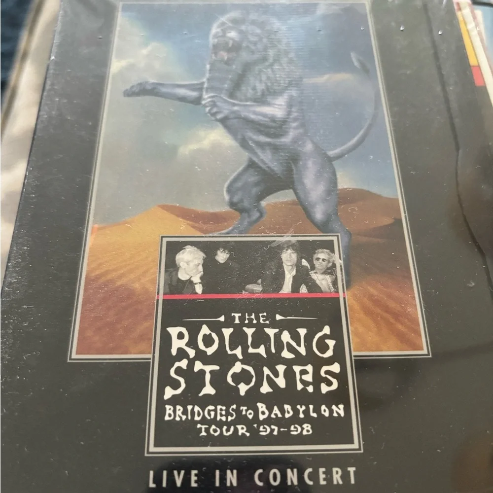 Two unopened Rolling Stones DVDS. Bridges to Babylon; rock ‘n’ roll Circus